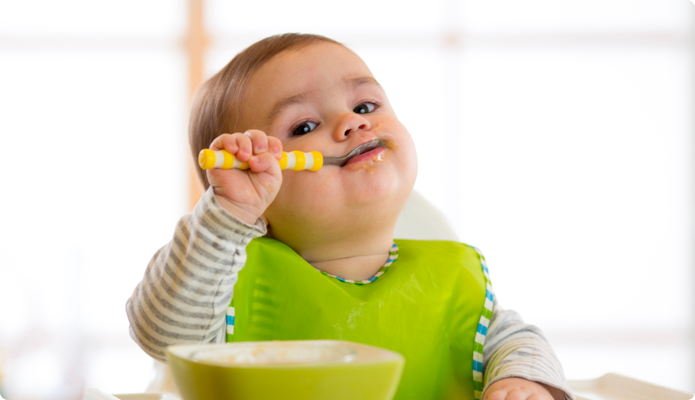 Baby eating cereal