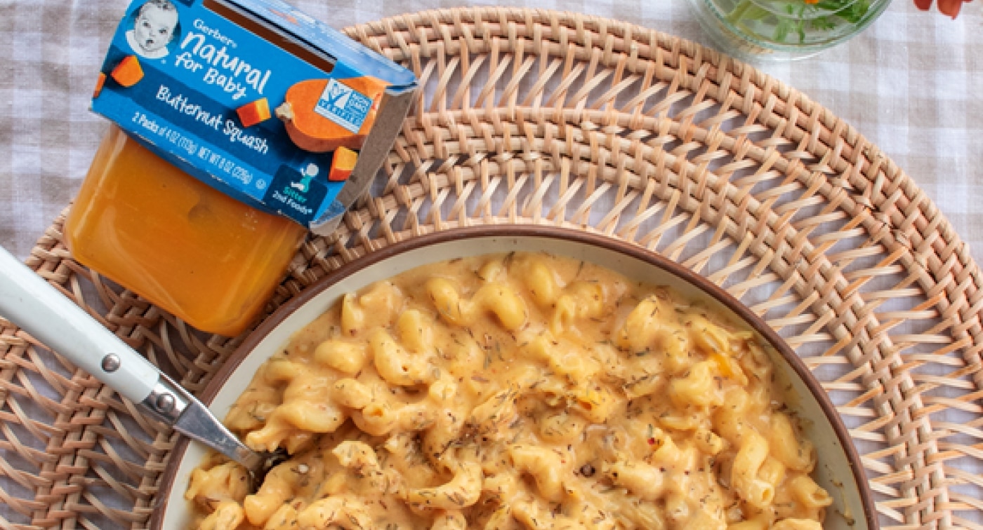 Bowl of macaroni and cheese made with Gerber butternut squash puree.