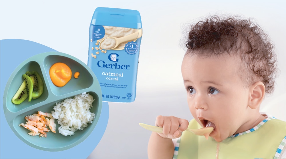 Baby girl feeding herself with a spoon